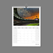 A4 Wall Calendar: Marvellous Melbourne featuring a stadium full of people with brilliant sunset and fireworks in background