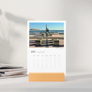 A5 Cards Calendar Moments of Melbourne displaying the month of January in a small stand, on a sideboard