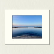 Ready to Frame Print: Fishermen and Foreshore - a frame mount containing a photo of fishermen in shallow waters against a pretty sky