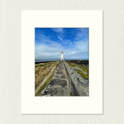 Ready to Frame Print: Griffiths Island Lighthouse - a frame mount containing a photo of a lighthouse at the end of a bluestone path