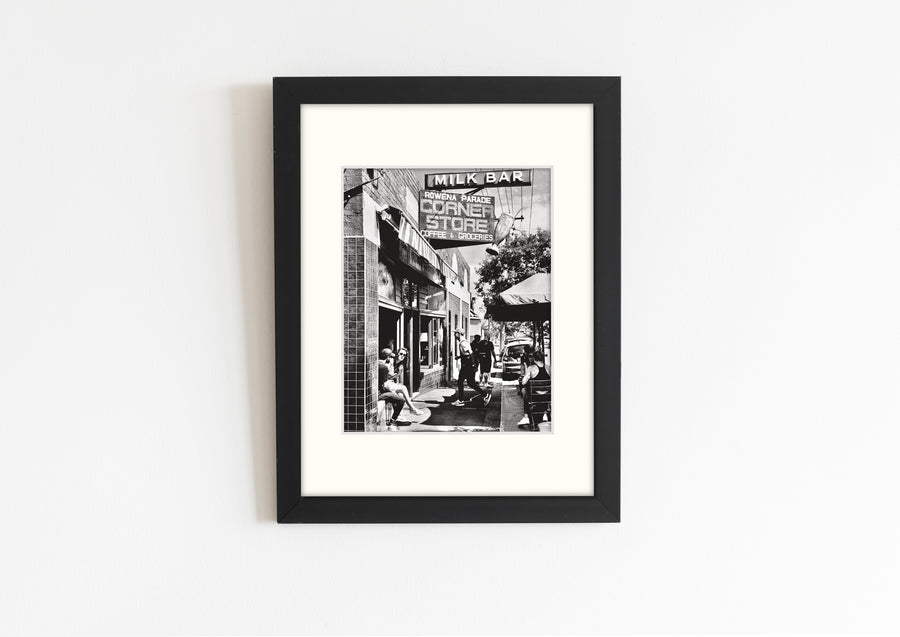 Frame mount with B&W print of a cool cafe in Richmond in finalised picture frame hanging on wall