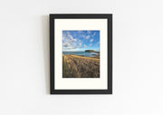 Frame mount with colour print of scenic Stanley, Tasmania in finalised picture frame hanging on wall